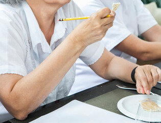 Chefs tasting traditional venezuelan casabe during culinary class
