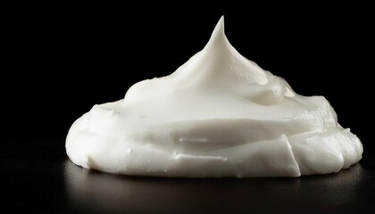 Creamy Whipped Topping Pile Against Dark Background