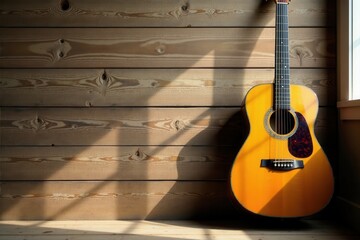 Obraz premium Sunlit Acoustic Guitar Against Wooden Wall, a Still Life Composition Featuring Warm Tones and Natural Light