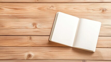 Open blank notebook on a rustic wooden surface inviting creativity and inspiration for writing and sketching