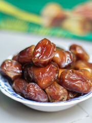 dates in a white bowl