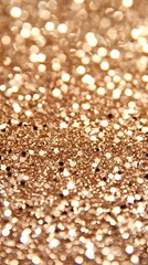 The glistening golden glitter texture background with blurred effect