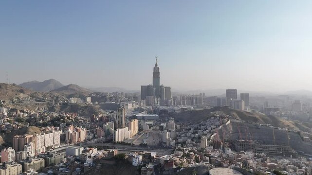 Aerial view Mecca skyline , Makkah city Saudi Arabia -  Makkah Clock Tower and hotels  - Masjid Al Haram 4k drone Video