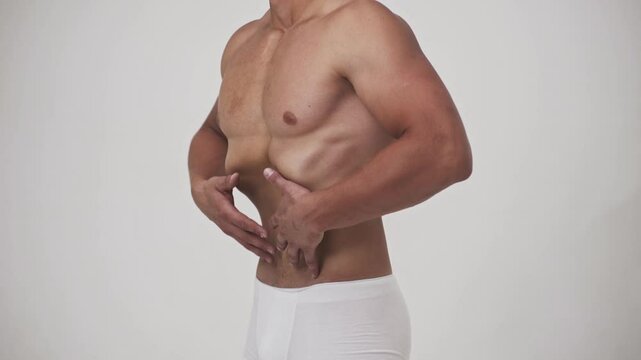 Fit belly workout. Man with abs. Slim abdominal muscles. Fitness enthusiast. Healthy belly abs workout. Athletic belly. Abs belly fitness training.