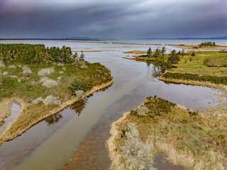 
Aerial view from a licensed drone of tidal wetlands at Fort Stevens State Park in Orego