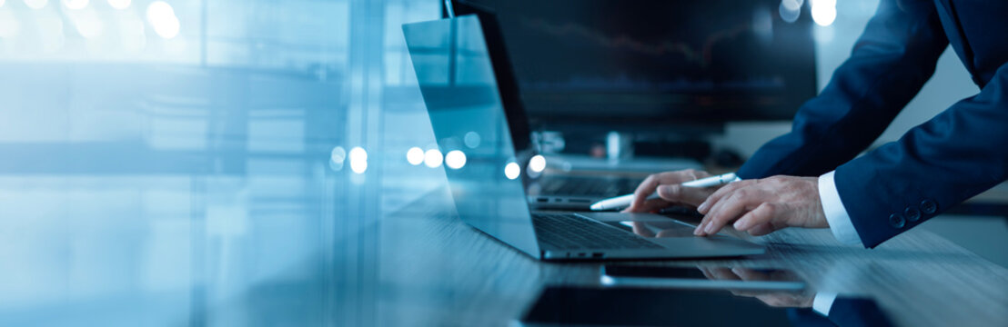 Business technology, Data science and digital marketing, Businessman using laptop with analysis data of growth to business on global network connection, Investment, Data exchange, Digital technology. - Powered by Adobe