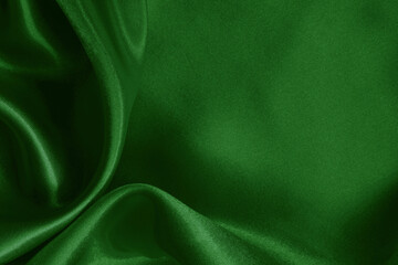 Dark green fabric cloth texture for background and design art work, beautiful crumpled pattern of...