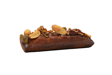 Piece of chocolate cake with nuts on a white background. Isolated