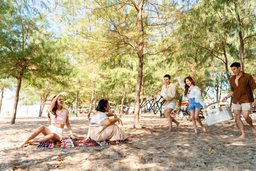 Happy Asian man and woman travel the sea on summer beach holiday vacation. Group of People friends...