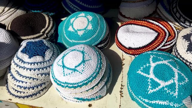 Jerusalem Old City Market, A stall selling a kippah, a Jewish religious cap. A kippah with a Star of David - a symbol of Israel