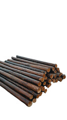Stacked wooden logs ready for construction or crafting in a workshop environment