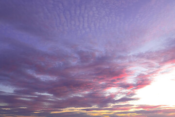 Spectacular purple and pink sunset in prairies with cloudy sky beautiful phenomenon in atmosphere.