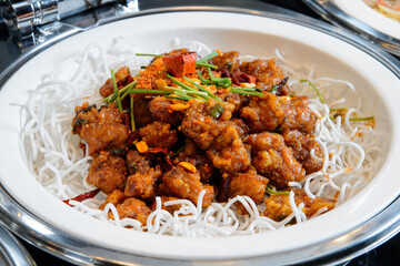 Fried chicken in spicy sauce