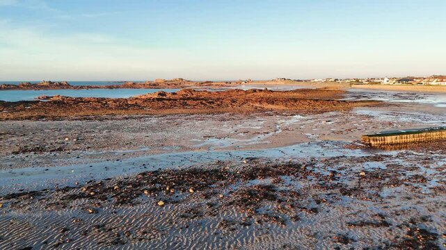 Drone shot of cobo beach Guernsey at low tide 23
