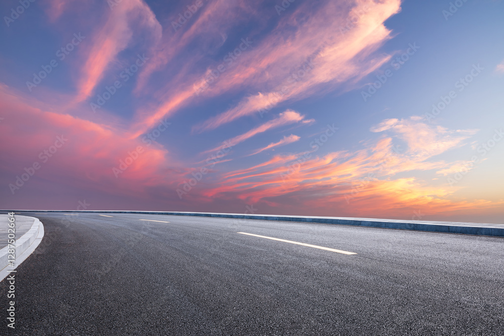 Poster Asphalt road with beautiful sky clouds at sunset