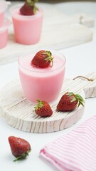 a cup of strawberry dessert isolated on white background