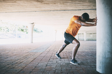 Fitness, workout and man with calf stretching in parking lot for marathon performance and running...