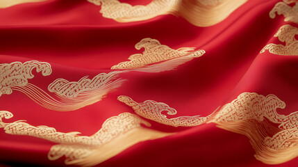 Obraz premium Radiant Red Fabric with Intricate Cloud Embroidery: A vibrant textile, adorned with detailed cloud patterns, drapes gracefully.