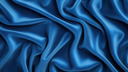 Fototapeta premium A close-up of luxurious blue satin fabric, showcasing its smooth texture and flowing folds.