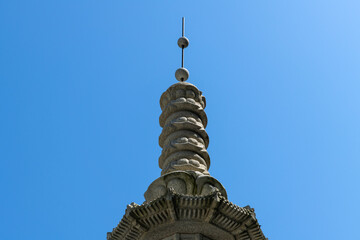 top of the stone tower in the Buddhist temple 