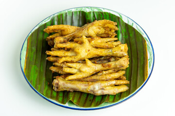 Fried chicken feet (Indonesian called ceker or cakar) with white background