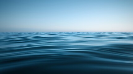 Naklejka premium Calm ocean surface at dawn, tranquil seascape, serene horizon