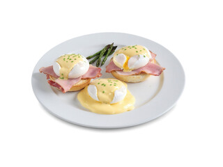 Eggs Benedict A plate of eggs Benedict with poached eggs, hollandaise sauce, ham, and a toasted English muffin. The hollandaise