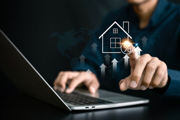 Real estate investment concept . Businessman use laptop with house icon for analyzing mortgage loan home and insurance real property mortgage. business real estate.