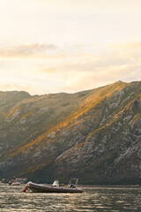 Adriatic sunset illuminating serene bay and slopes