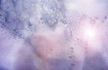 foam blue texture soap bubbles on the water abstract background