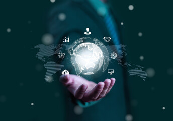 Hand holding globe with data connection network icon, Developing the changing intelligent data and global business development, Applying the digital technology of artificial intelligence.