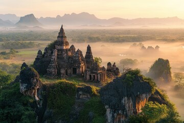 Ancient Temple Ruins at Sunrise in Misty Valley