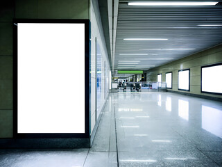 Blank digital billboard mockup in metro station platform. Modern design. Empty space for advertisement. Suitable for marketing presentations retail ads. Horizontal outdoor advertising media display
