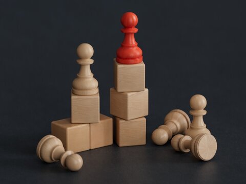 Competitions and winning. Leadership mockup, empty copy space. Wooden champions on winner pedestal and losers on floor.Made and rendered in C4D, not AI.