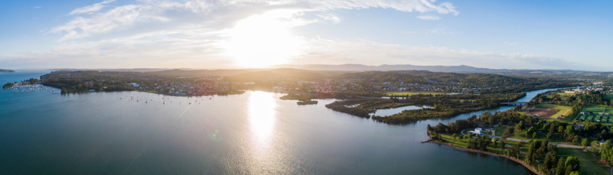 Aerial panorama of Cockle bay, five islands and Speers Point in Lake Macquarie as the sun sets