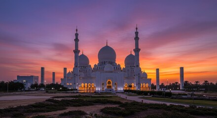 Majestic mosque silhouette at sunset, vibrant sky, peaceful surroundings