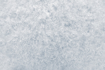 Obraz premium Ice texture crystal, blue tones background. Textured cold white frosty surface of ice.
