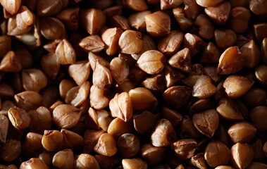 A close up of a pile of brown grains