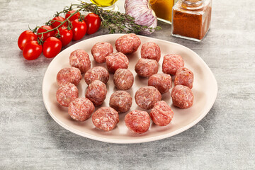 Uncooked raw beef meatball minced