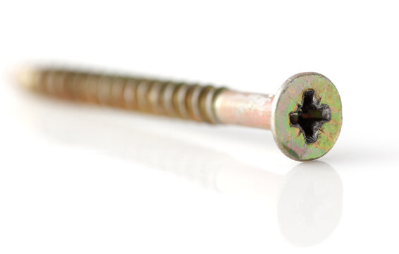 A screw head is shown in a close up