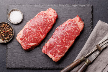 Raw marbled striploin steak, fresh, rich, ready for cooking