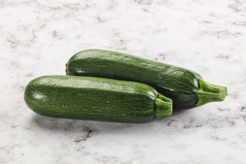 Raw green ripe zucchini vegetable