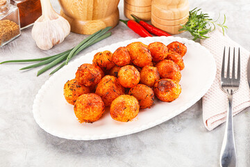 Baked young potato with paprika