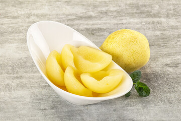 Canned yellow pear with syrup