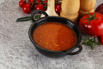 Hot tomato soup with diced chicken