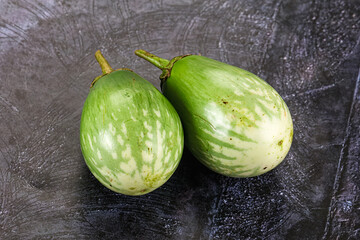 Ripe green mini eggplants heap