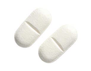 Two white medical tablets with scored lines, isolated on transparent cutout background