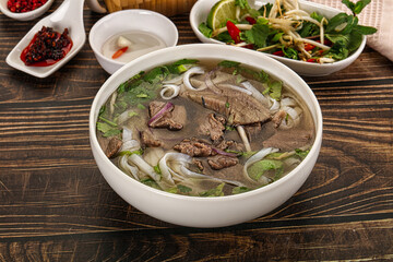 Vietnamese Pho Bo soup with beef and noodles