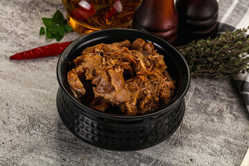 Shredded slow cooked pork meat