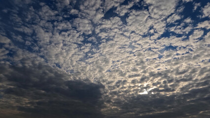 nice sundown goldish clouds on the sky backdrop - photo of nature
